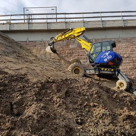 Erdbewegungen- Schreitbagger Handl Mike 8