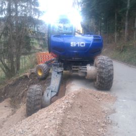 Erdbewegungen- Schreitbagger Handl Mike 17